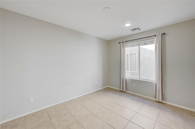 unfurnished room featuring visible vents, baseboards, recessed lighting, and light tile patterned floors