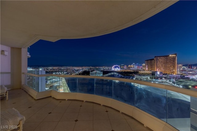 pool at night with a view of city lights