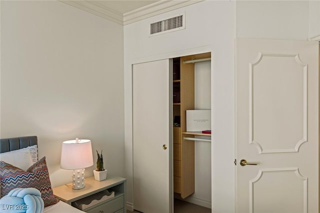 2877 Paradise Rd Unit 2502, Las Vegas, NV 89109 - bedroom with crown molding and a closet