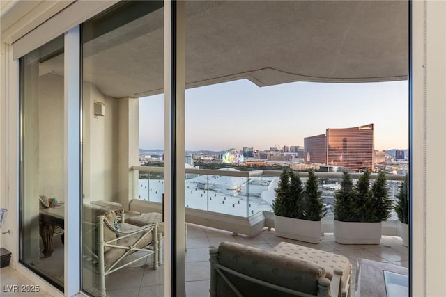 2877 Paradise Rd Unit 2502, Las Vegas, NV 89109 - balcony at dusk featuring a city view