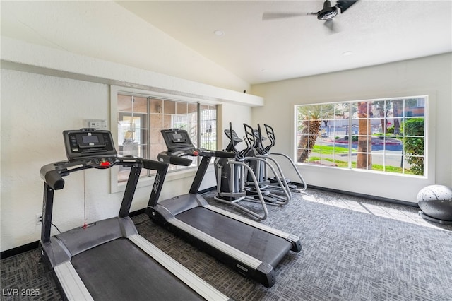 gym with a ceiling fan, baseboards, carpet floors, and plenty of natural light