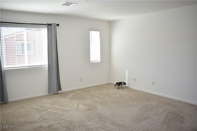 12186 Scarlet Ember Rd Unit 3, Las Vegas, NV 89183 - carpeted empty room featuring baseboards and visible vents