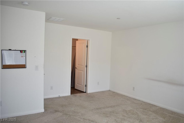 12186 Scarlet Ember Rd Unit 3, Las Vegas, NV 89183 - carpeted empty room featuring visible vents and baseboards