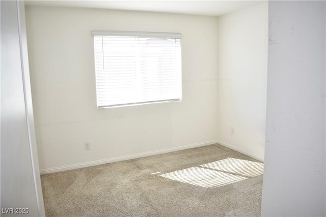 12186 Scarlet Ember Rd Unit 3, Las Vegas, NV 89183 - unfurnished room with baseboards and carpet