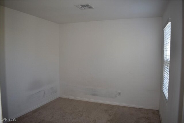 12186 Scarlet Ember Rd Unit 3, Las Vegas, NV 89183 - unfurnished room with carpet floors, a healthy amount of sunlight, visible vents, and baseboards