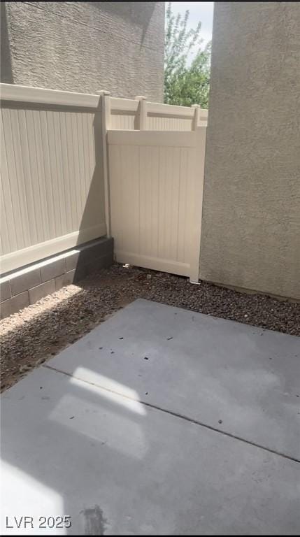 12186 Scarlet Ember Rd Unit 3, Las Vegas, NV 89183 - view of patio featuring fence