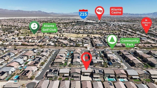 bird's eye view with a mountain view and a residential view