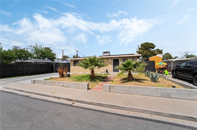 4630 Gabriel Dr, Las Vegas, NV 89121 - view of front of house featuring fence and stucco siding