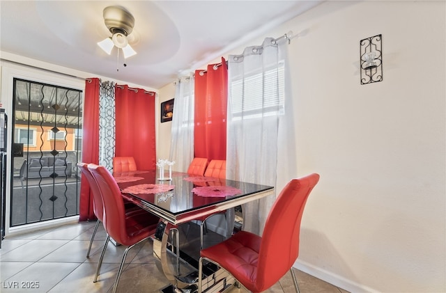 4630 Gabriel Dr, Las Vegas, NV 89121 - dining area with tile patterned floors, baseboards, and a ceiling fan