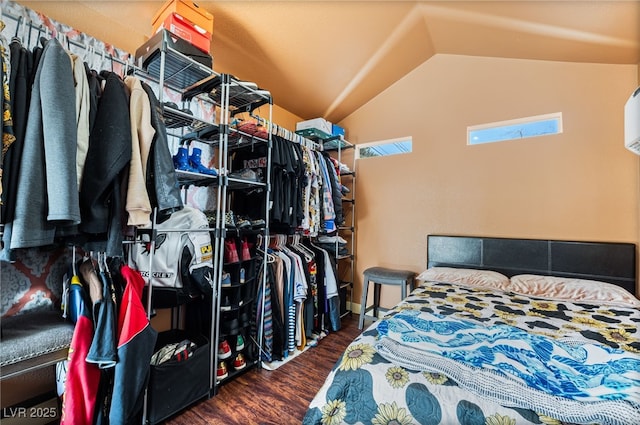 4630 Gabriel Dr, Las Vegas, NV 89121 - spacious closet with vaulted ceiling and wood finished floors