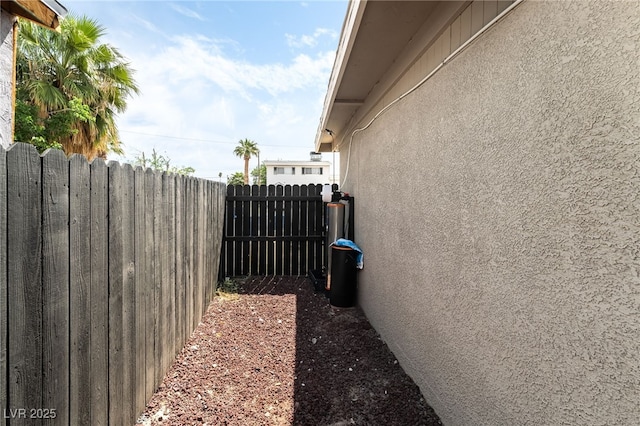 4630 Gabriel Dr, Las Vegas, NV 89121 - view of side of property with stucco siding and fence