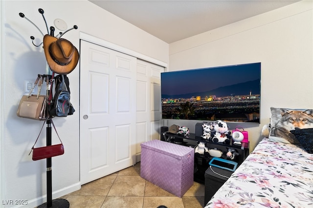 4630 Gabriel Dr, Las Vegas, NV 89121 - tiled bedroom with a closet
