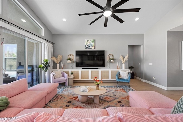8440 Footpath St, Las Vegas, NV 89166 - living area featuring lofted ceiling, wood finished floors, baseboards, ceiling fan, and recessed lighting