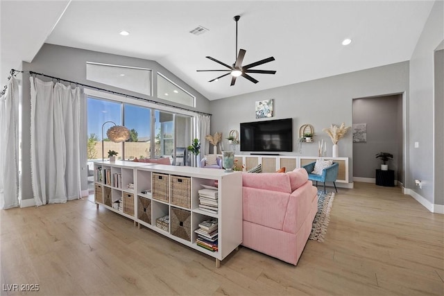 8440 Footpath St, Las Vegas, NV 89166 - living area with ceiling fan, vaulted ceiling, light wood finished floors, baseboards, and recessed lighting