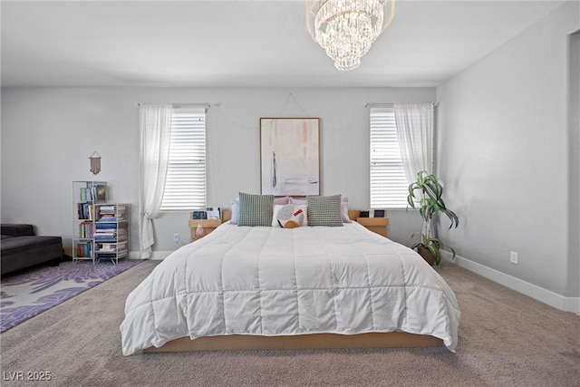 8440 Footpath St, Las Vegas, NV 89166 - bedroom with a chandelier, carpet flooring, and baseboards