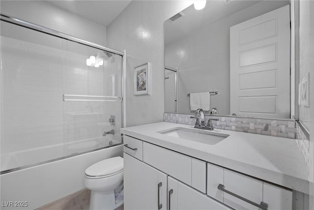 8440 Footpath St, Las Vegas, NV 89166 - full bathroom with vanity, toilet, and shower / bath combination with glass door