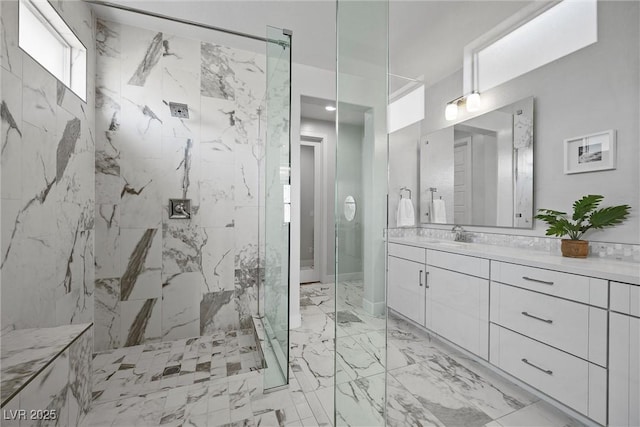 8440 Footpath St, Las Vegas, NV 89166 - bathroom with a marble finish shower, vanity, and marble finish flooring