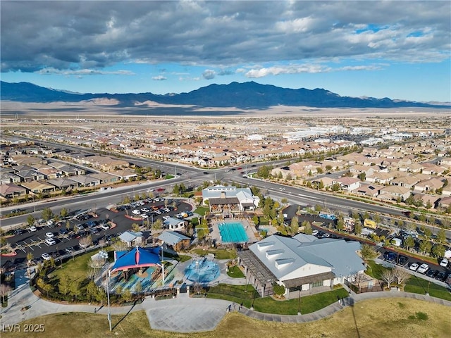 8440 Footpath St, Las Vegas, NV 89166 - aerial view of property's location featuring a mountain backdrop and nearby suburban area