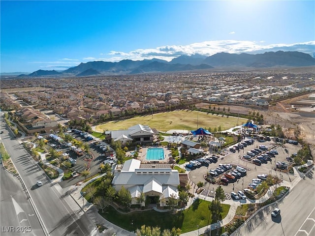 8440 Footpath St, Las Vegas, NV 89166 - view of property location with mountains, a pool area, and nearby suburban area
