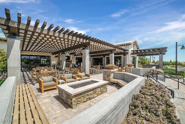 8440 Footpath St, Las Vegas, NV 89166 - view of patio / terrace with a pergola and an outdoor fire pit