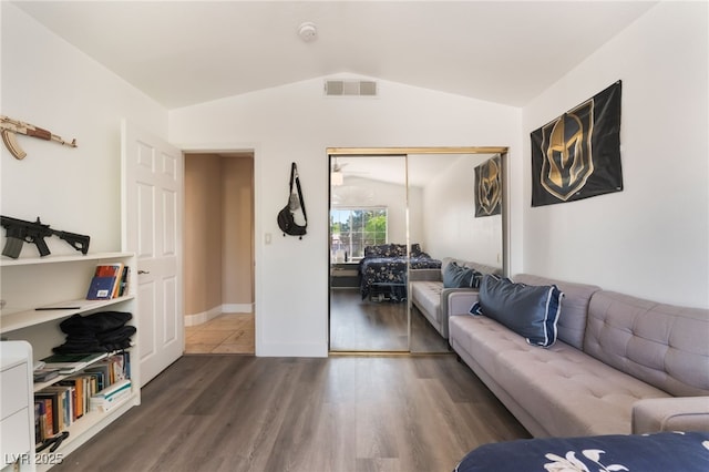 9000 Cotton Rose Way, Las Vegas, NV 89134 - living area featuring wood finished floors, lofted ceiling, and visible vents