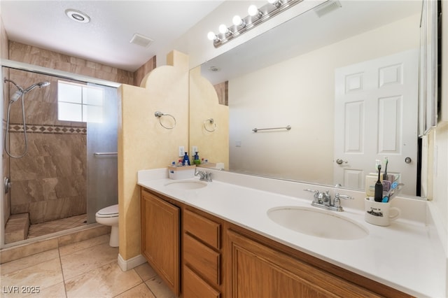 9000 Cotton Rose Way, Las Vegas, NV 89134 - full bath with toilet, a sink, a tile shower, and visible vents