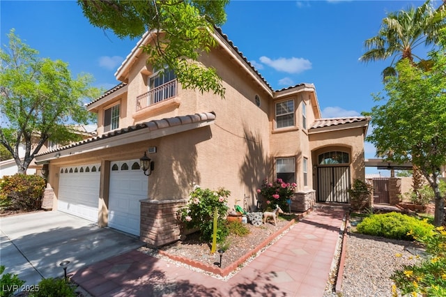 9000 Cotton Rose Way, Las Vegas, NV 89134 - mediterranean / spanish-style house featuring an attached garage, a tiled roof, concrete driveway, and stucco siding