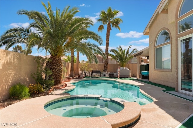 9000 Cotton Rose Way, Las Vegas, NV 89134 - view of pool with a fenced backyard, a pool with connected hot tub, and a patio