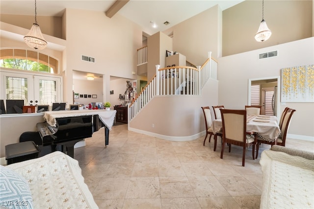 9000 Cotton Rose Way, Las Vegas, NV 89134 - interior space with high vaulted ceiling, baseboards, visible vents, and stairs