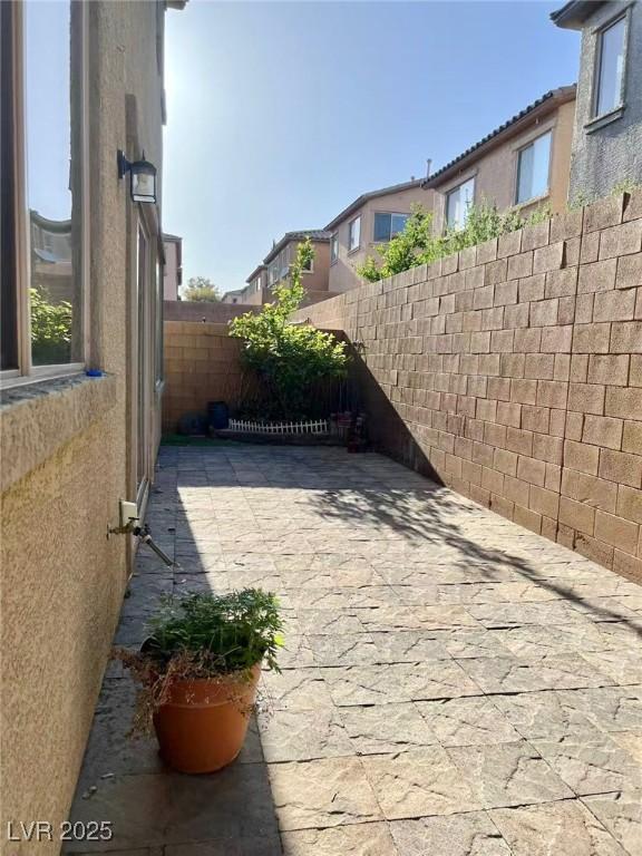 view of patio featuring a fenced backyard