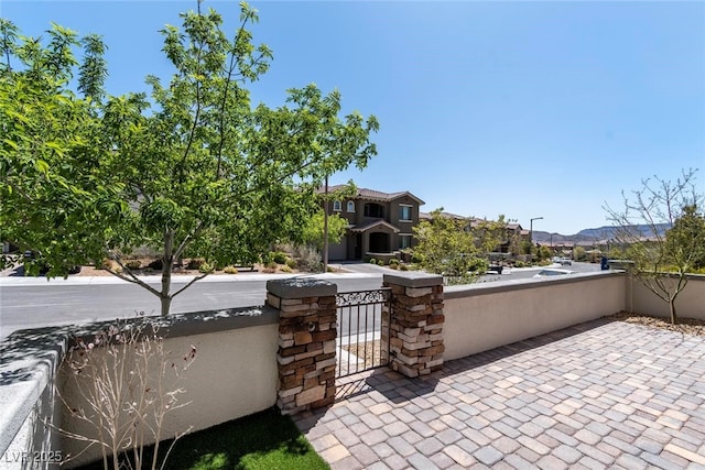 257 Elder View Dr, Las Vegas, NV 89138 - view of patio / terrace with a mountain view