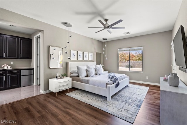 257 Elder View Dr, Las Vegas, NV 89138 - bedroom with dark wood-style flooring, freestanding refrigerator, baseboards, and a ceiling fan