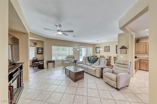 1862 Redwood Valley St, Henderson, NV 89052 - living area with light tile patterned floors and a ceiling fan