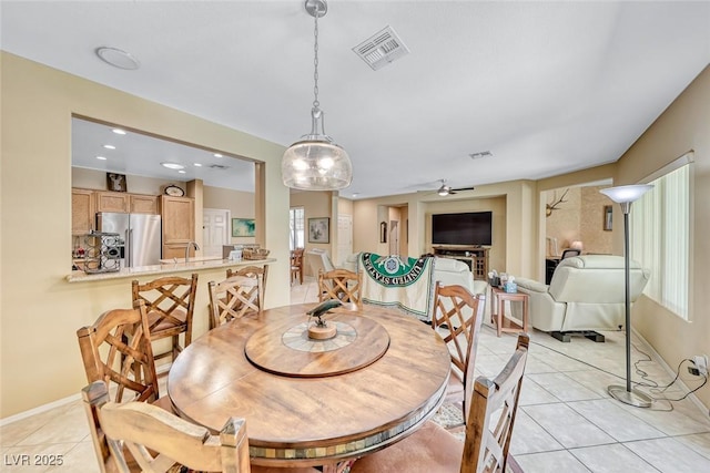 1862 Redwood Valley St, Henderson, NV 89052 - dining area featuring a ceiling fan, visible vents, and light tile patterned floors