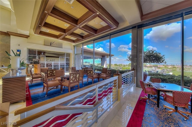 1862 Redwood Valley St, Henderson, NV 89052 - sunroom / solarium featuring a high ceiling, beam ceiling, tile patterned flooring, expansive windows, and coffered ceiling