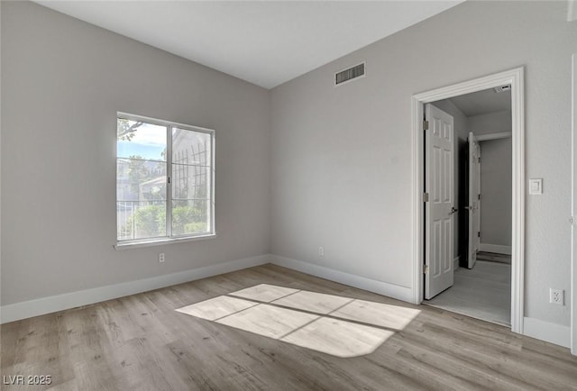 2212 Warm Walnut Dr, Las Vegas, NV 89134 - unfurnished room featuring wood finished floors and baseboards