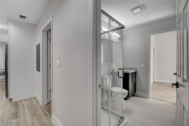 2212 Warm Walnut Dr, Las Vegas, NV 89134 - hall featuring light wood-style flooring and baseboards