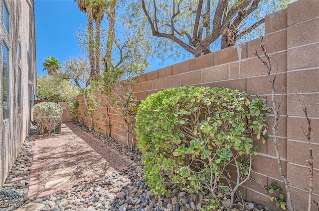 exterior space featuring a fenced backyard