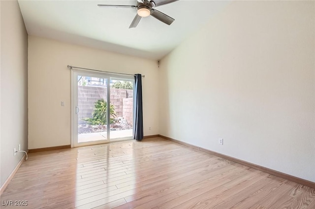 unfurnished room with light wood-type flooring, a ceiling fan, and baseboards