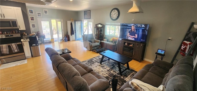 5312 Manuel Dr, Las Vegas, NV 89149 - living area with light wood-style flooring and a wealth of natural light