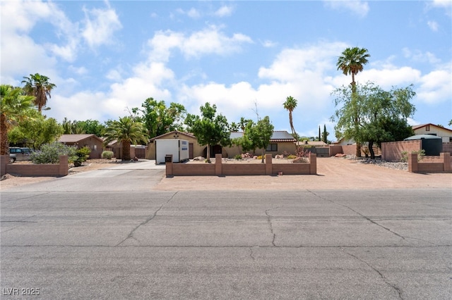 5312 Manuel Dr, Las Vegas, NV 89149 - view of front of home with a fenced front yard and driveway