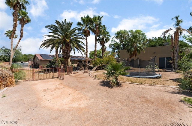 5312 Manuel Dr, Las Vegas, NV 89149 - view of yard featuring a trampoline
