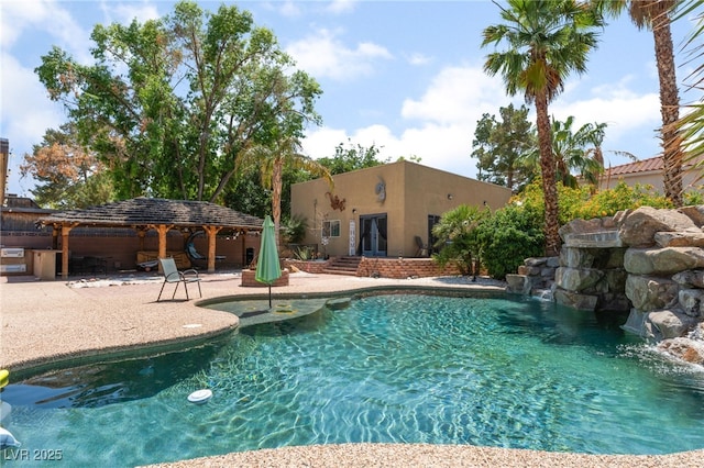 5312 Manuel Dr, Las Vegas, NV 89149 - swimming pool with french doors, a gazebo, and a patio