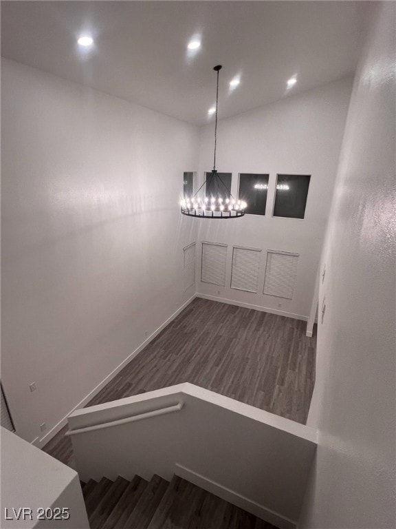 3686 Lincoln Rd, Las Vegas, NV 89115 - staircase featuring baseboards, an inviting chandelier, and wood finished floors