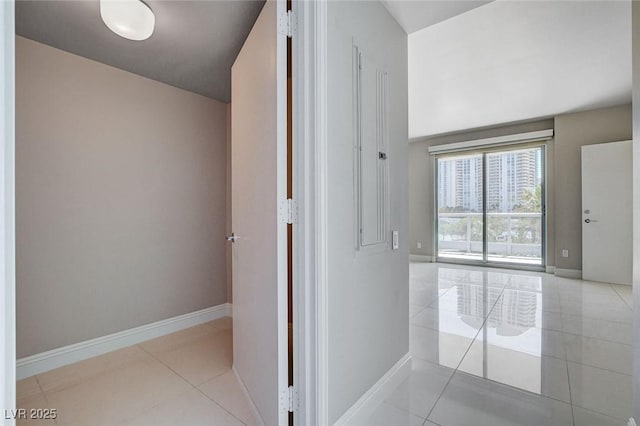222 Karen Ave Unit 302, Las Vegas, NV 89109 - corridor with baseboards and light tile patterned floors