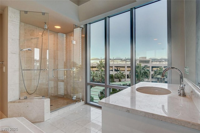 222 Karen Ave Unit 302, Las Vegas, NV 89109 - full bath with recessed lighting, a shower stall, tile patterned flooring, and vanity