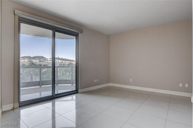 222 Karen Ave Unit 302, Las Vegas, NV 89109 - empty room with light tile patterned flooring and baseboards