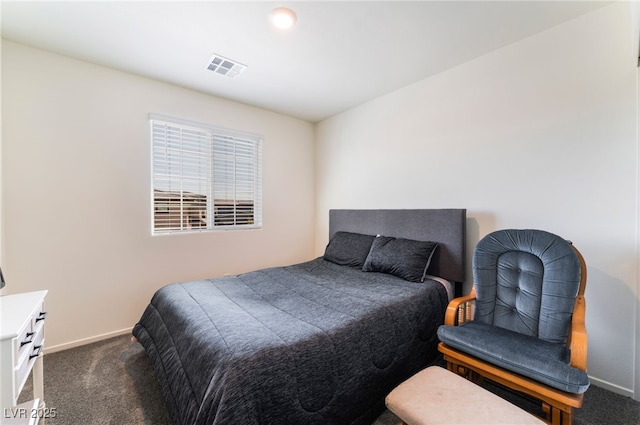 bedroom with visible vents, baseboards, and carpet