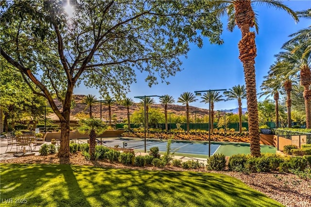 11573 Glowing Sunset Ln, Las Vegas, NV 89135 - view of tennis court with a mountain view