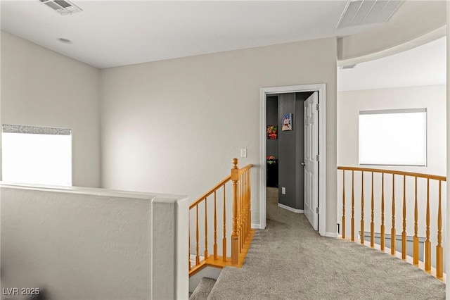 2244 Manosque Ln, Henderson, NV 89044 - hallway with an upstairs landing, carpet flooring, baseboards, and visible vents